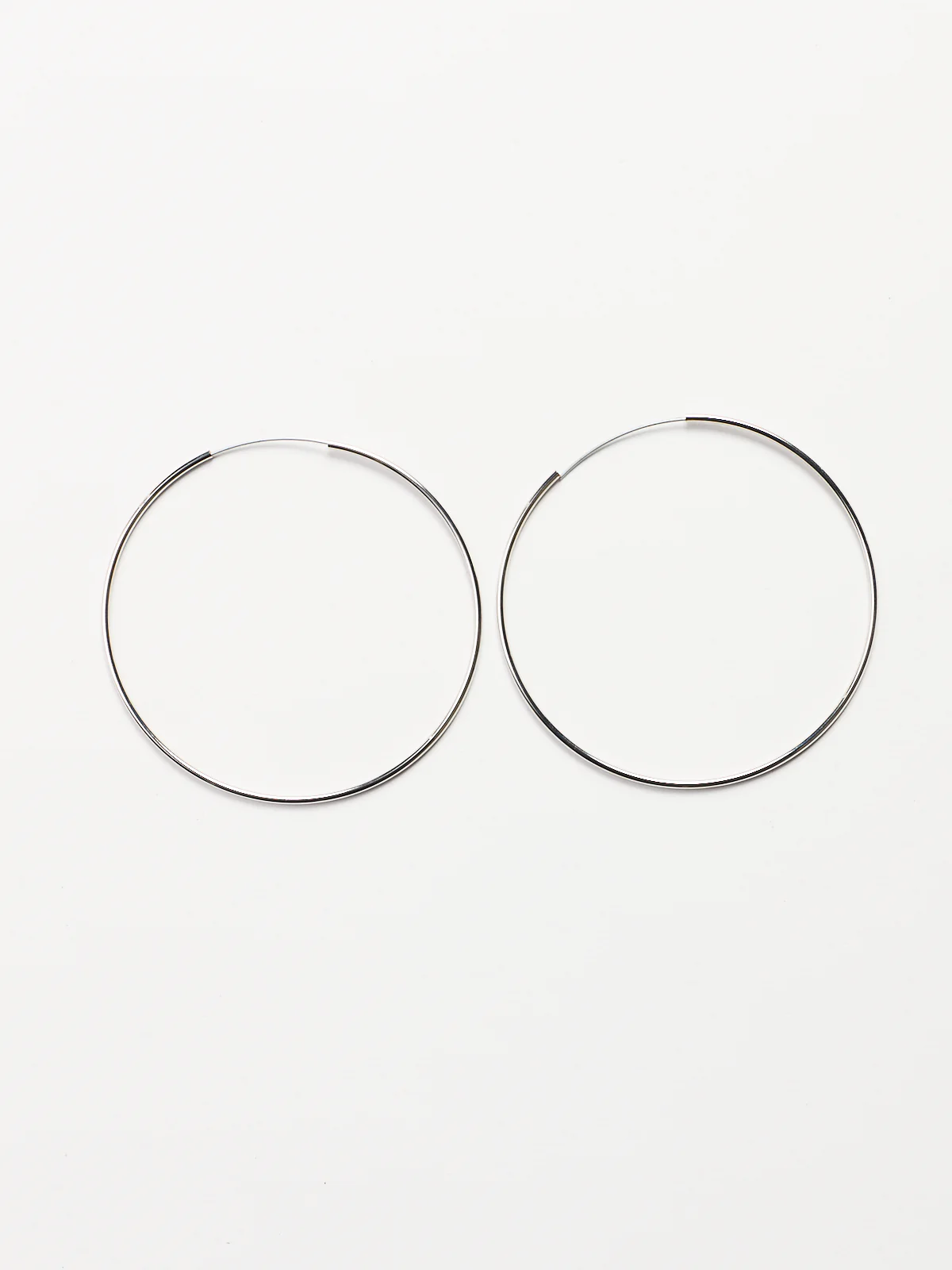 Thin Endless Hoop Earrings - Image 2